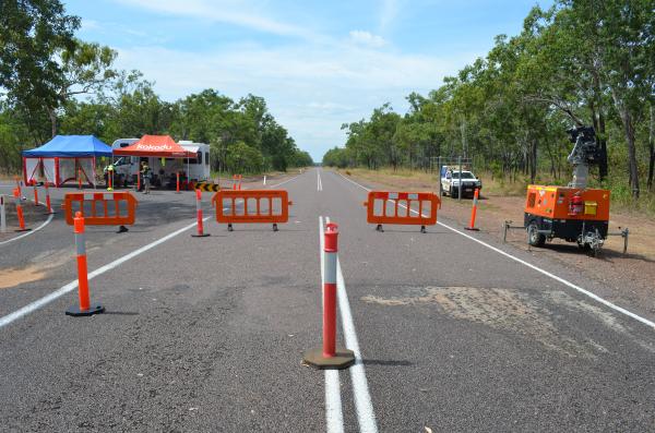 Barricades blocking Arnhem Highway at Biosecurity zone perimeter, May 2020.